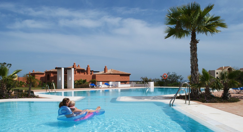 Relaxing at the pool in Lomas del Marques